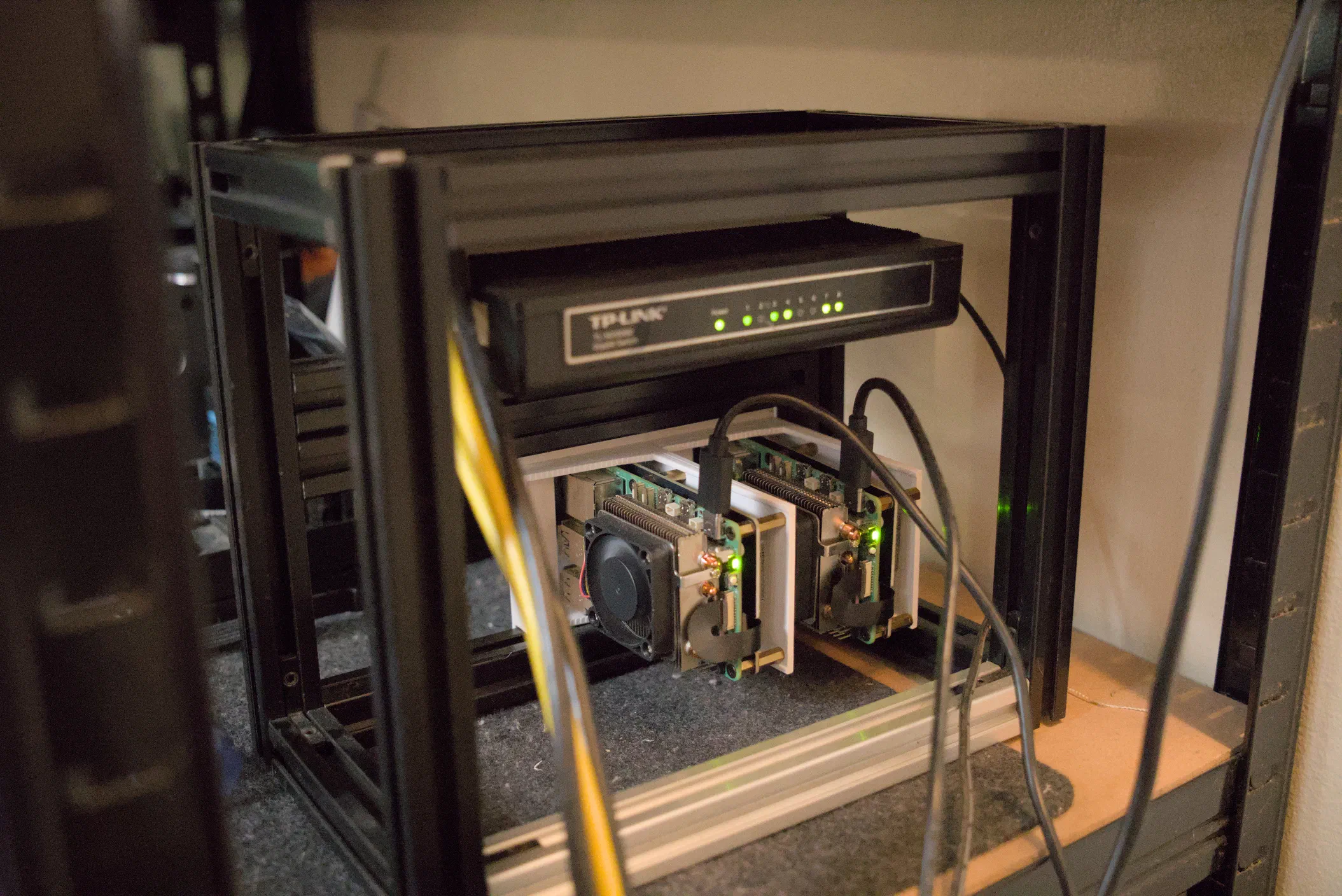 A pair of Raspberry Pi's on my DIY mini server rack